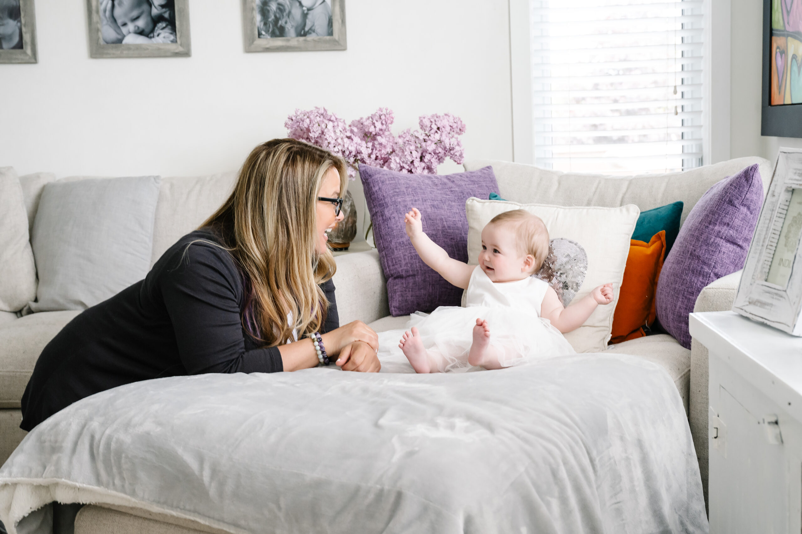 Tracy Braunstein playing with baby
